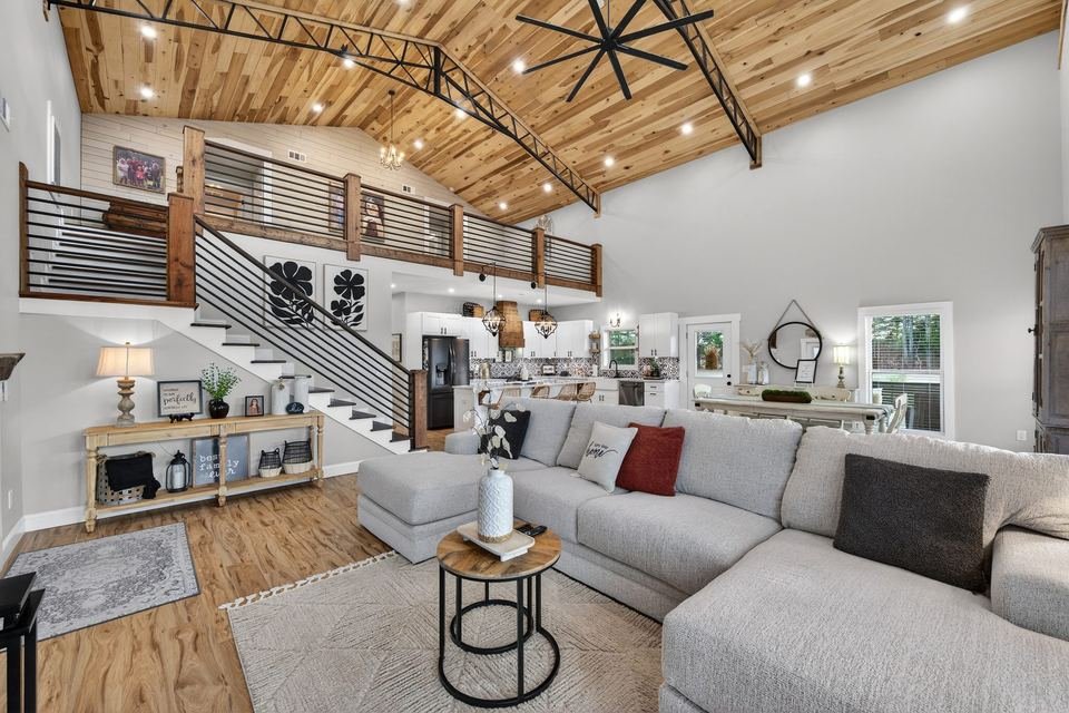 Open concept living room and kitchen photographed for a real estate listing in Tennessee