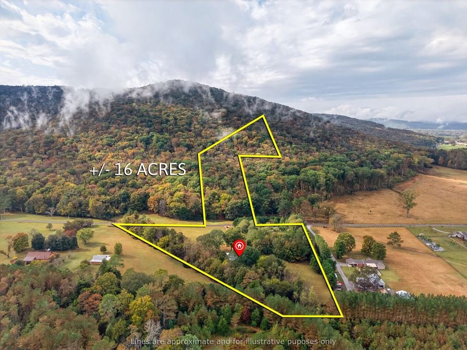 Mountain acreage aerial drone photography with property boundary overlay