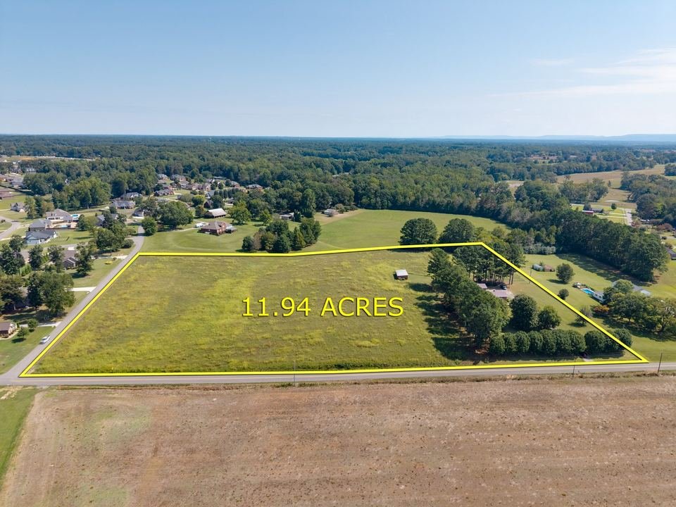 Commercial land aerial drone photography with boundary overlay